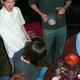 Ruzek (left) entertains friends during a recent manic spell.
